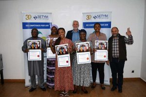 The group of learners of the BDIC training as well as the CEO of SETYM and his computer technician.